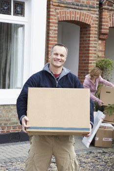 Removal van and movers preparing a South Tottenham home move